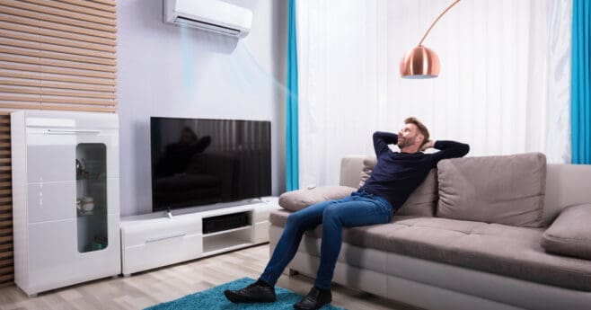 Man Relaxing with Home Aircon