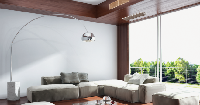 Stylish living room with bulkhead air conditioner vents installed.